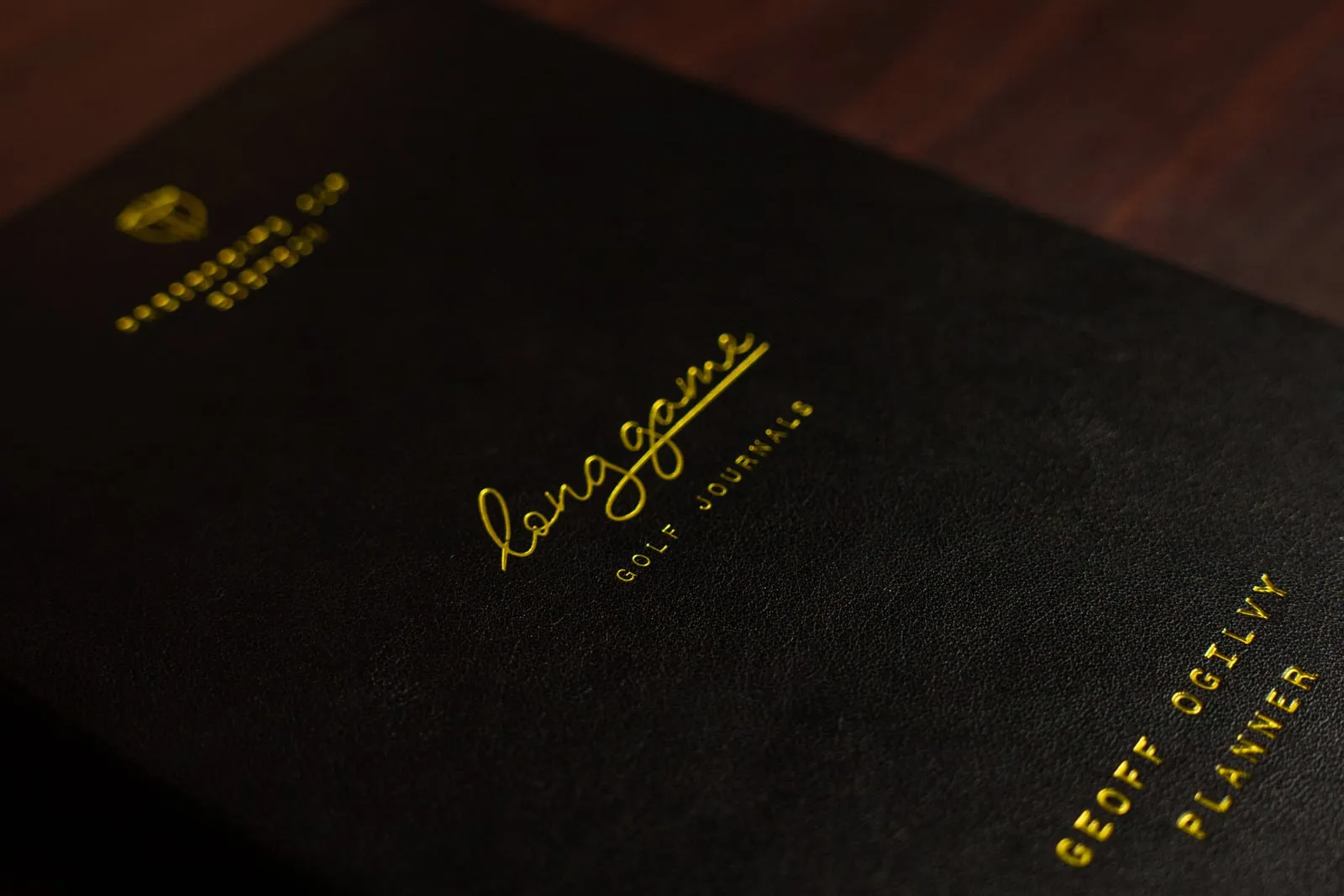 The Planner made for the International Team, black cover with gold foil