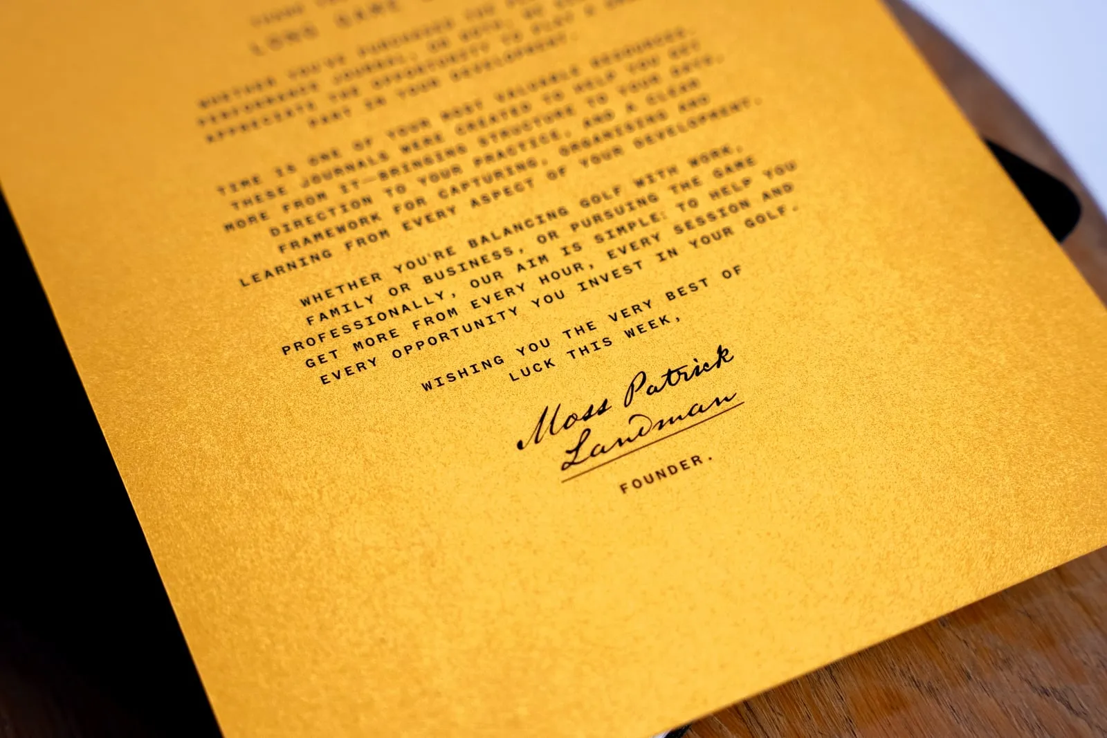 The founder's note, printed on gold card
