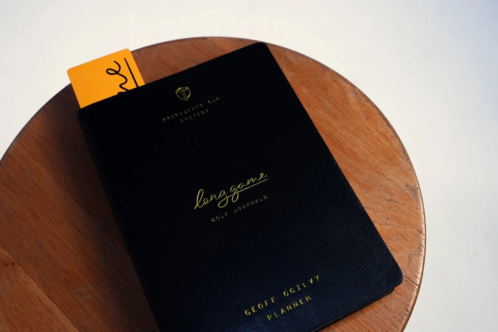 The Planner with its bookmark, the crest and the captain's name in gold