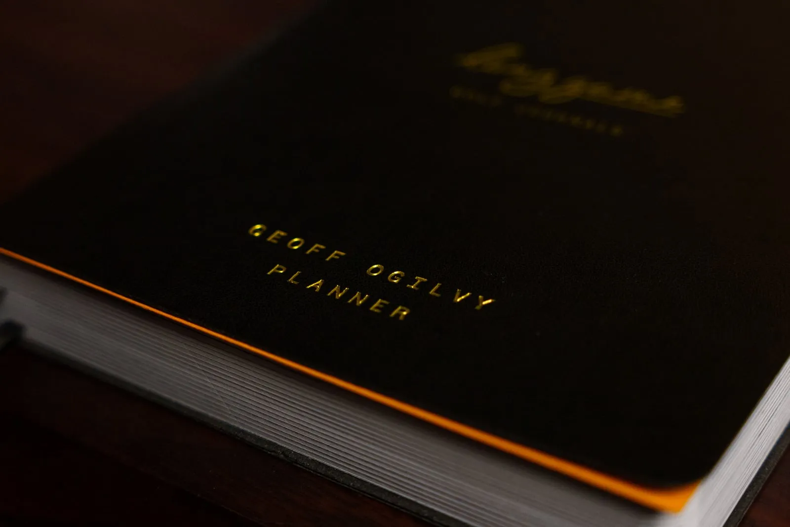 The Planner, showing its orange page edges